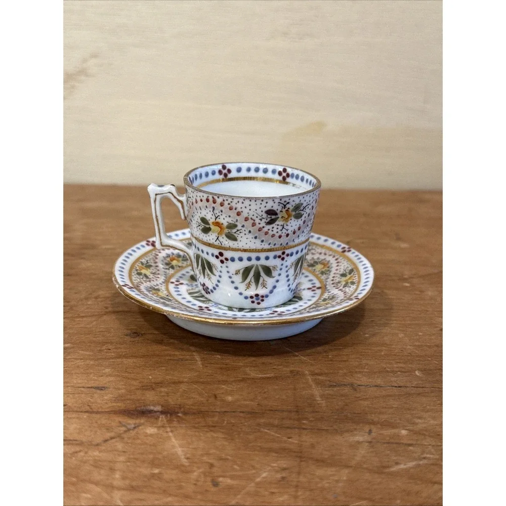 Antique Austrian demitasse cup and saucer hand painted floral gold trim